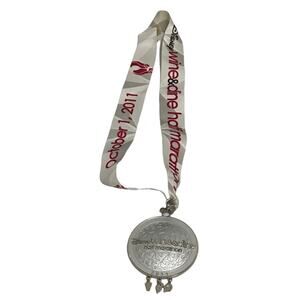 Run Disney Wine & Dine Half Marathon medal from 2011